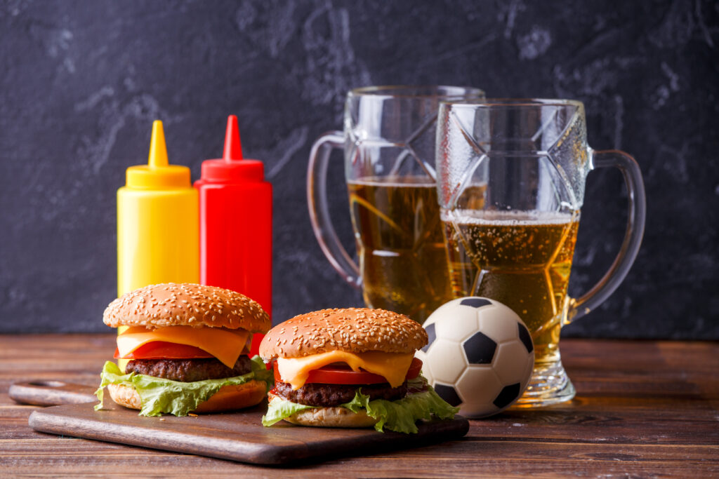 image two hamburgers glasses soccer ball ketchup